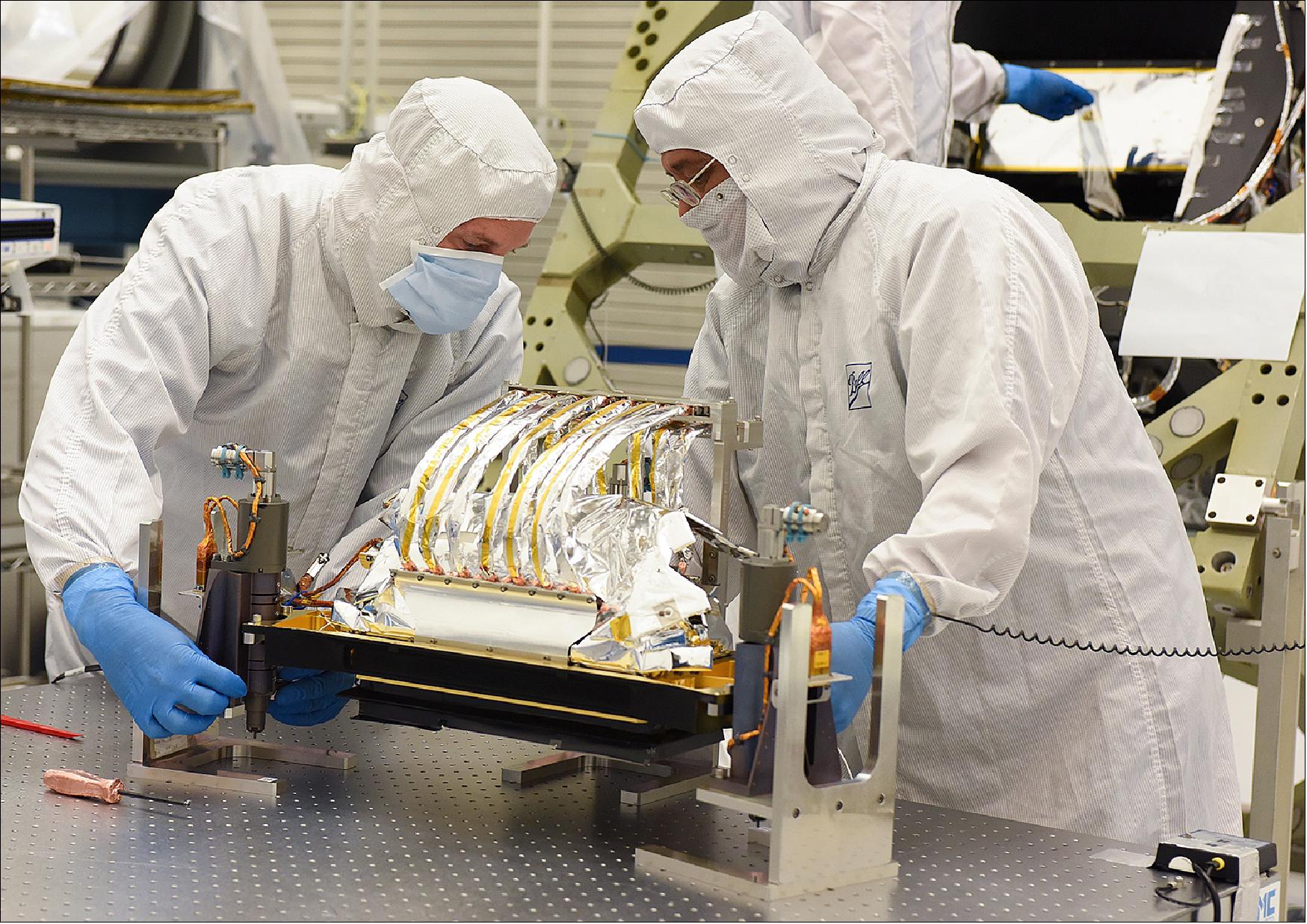 Figure 10: Ball Aerospace technicians prepare to install the focal plane assembly, a 14-module detector array, into the OLI-2 (Operational Land Imager 2), one of the key science instruments for Landsat-9 (image credit: Ball Aerospace)