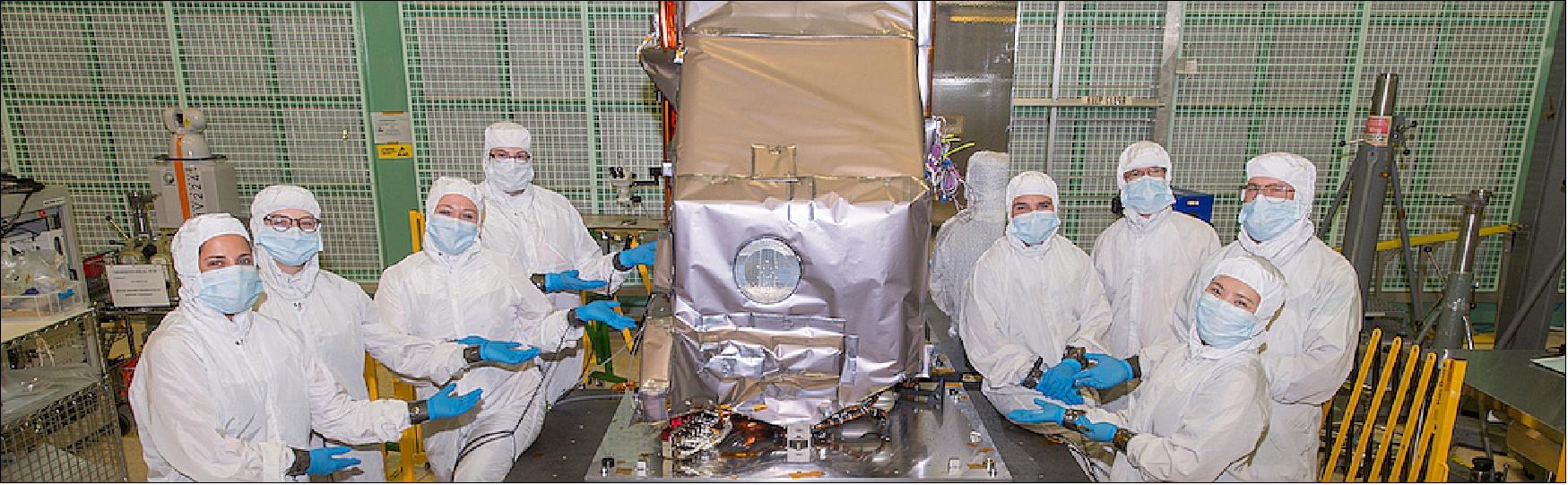 Figure 8: Engineers pose with the TIRS-2 instrument, which was built and tested at NASA Goddard (image credit: NASA)