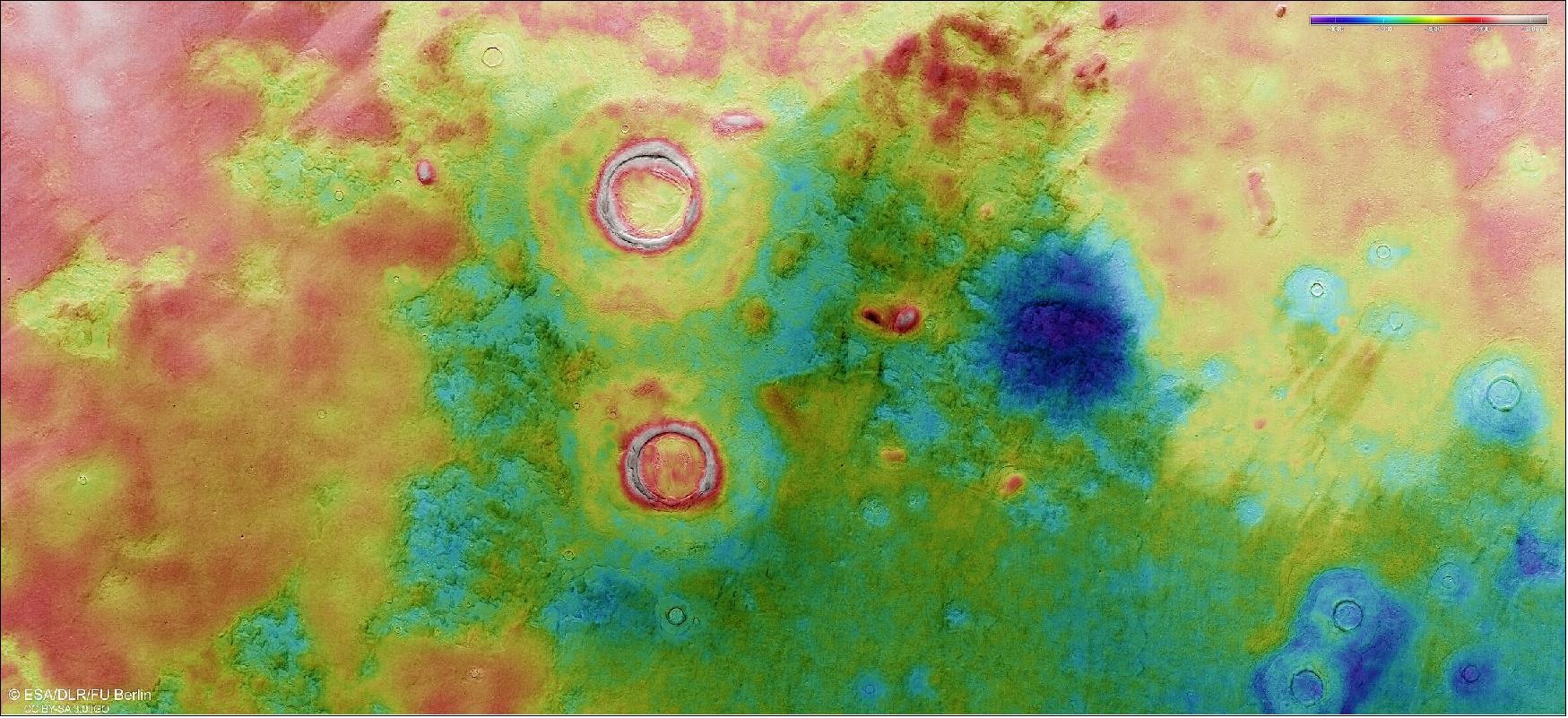 Figure 24: This colour-coded topographic image of Utopia Planitia was created from data collected by ESA’s Mars Express on 12 July 2021. It is based on a digital terrain model of the region, from which the topography of the landscape can be derived. Lower parts of the surface are shown in blues and purples, while higher altitude regions show up in whites and reds, as indicated on the scale to the top right. North is to the right. The ground resolution is approximately 19 m/pixel and the images are centred at about 83ºE/43ºN (ESA/DLR/FU Berlin, CC BY-SA 3.0 IGO)