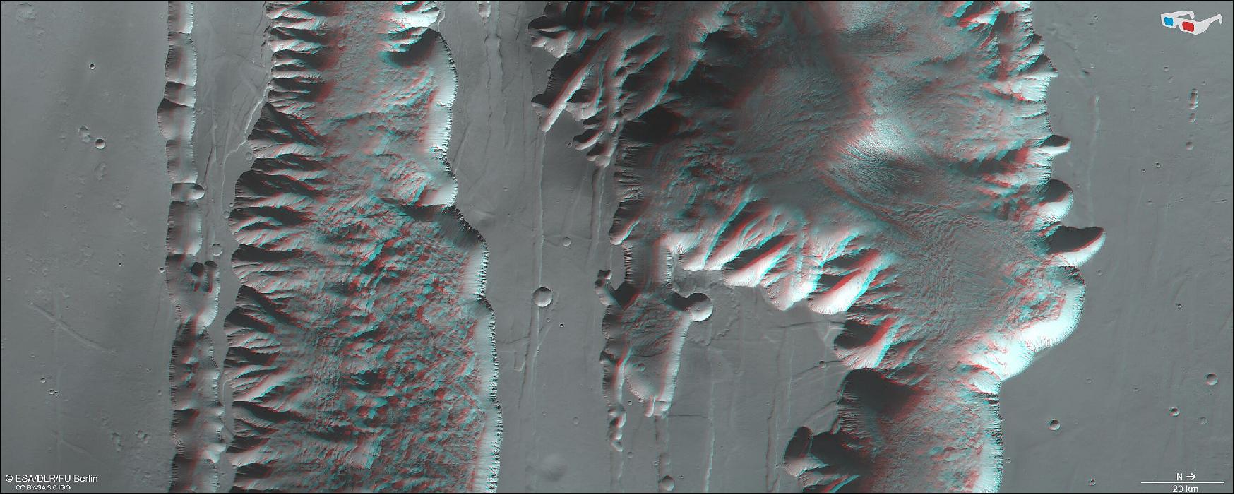 Figure 10: Ius and Tithonium Chasmata in 3D. This stereoscopic image shows Ius and Tithonium Chasmata, which form part of Mars’ Valles Marineris canyon structure. It was generated from data captured by the High Resolution Stereo Camera (HRSC) on ESA’s Mars Express on 21 April 2022 during orbit 23123. The anaglyph, derived from data acquired by the nadir channel and one stereo channel of the HRSC, offers a three-dimensional view when viewed using red-green or red-blue glasses (image credit: ESA/DLR/FU Berlin, CC BY-SA 3.0 IGO)