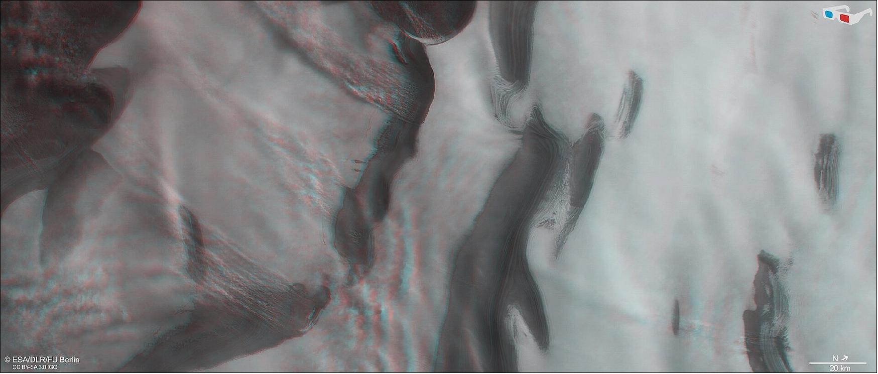 Figure 105: This image shows part of the ice cap at Mars' north pole in 3D when viewed using red-green or red-blue glasses. This anaglyph was derived from data obtained by the nadir and stereo channels of the HRSC on ESA’s Mars Express during spacecraft orbit 3670. It covers a part of the martian surface centered at about 244ºE/85ºN. North is to the upper right (image credit: ESA/DLR/FU Berlin, CC BY-SA 3.0 IGO)