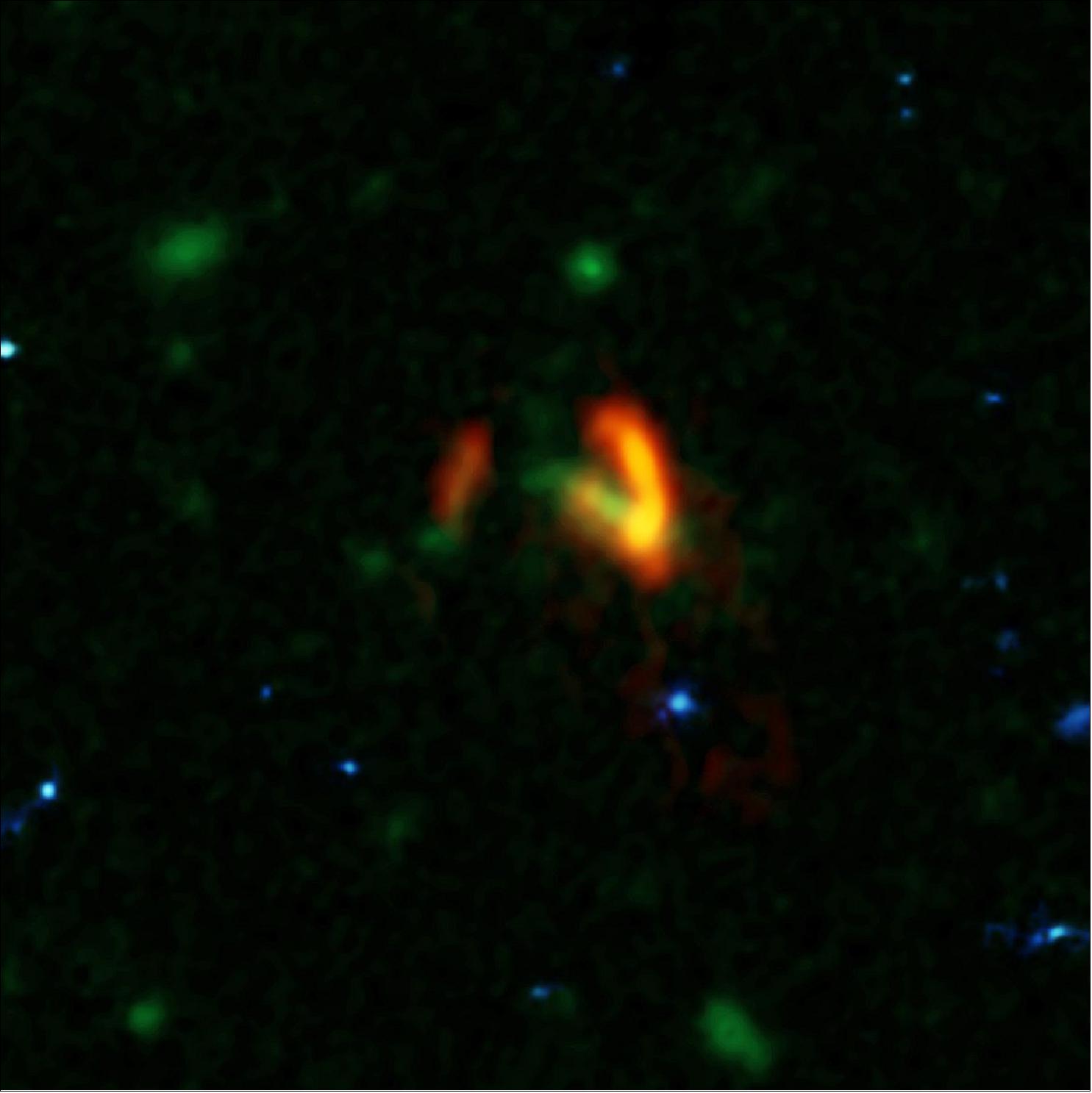 Figure 64: A composite image showing ALMA data (red) of the two galaxies of SPT0311-58. These galaxies are shown over a background from the Hubble Space Telescope (blue and green). The ALMA data show the two galaxies' dusty glow. The image of the galaxy on the right is distorted by gravitational lensing. The nearer foreground lensing galaxy is the green object between the two galaxies imaged by ALMA [image credit: ALMA (ESO/NAOJ/NRAO), Marrone, et al.; B. Saxton (NRAO/AUI/NSF); NASA/ESA Hubble]