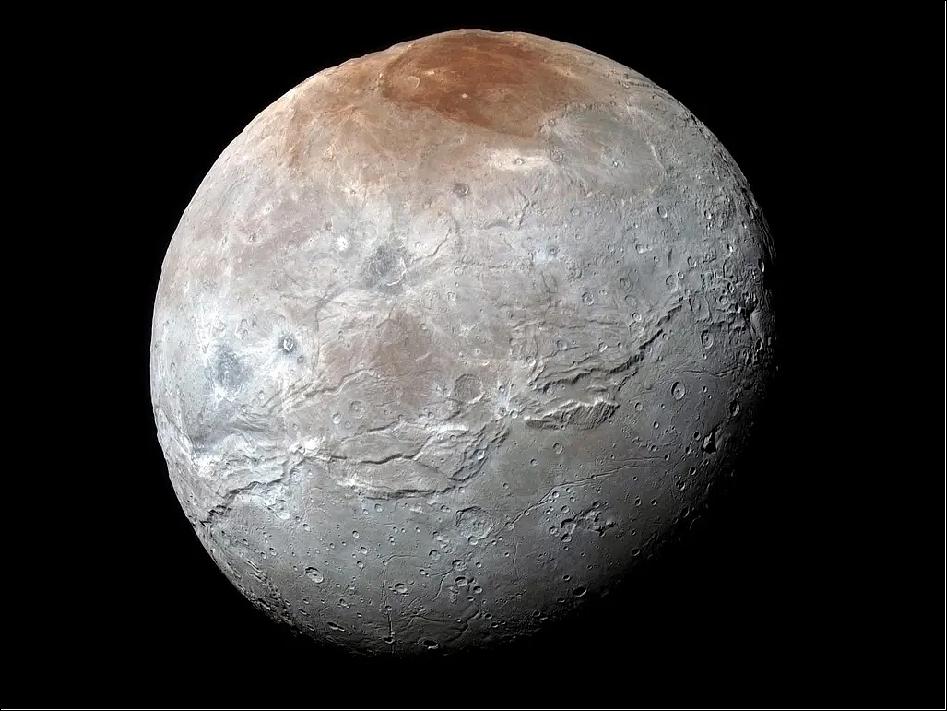 Figure 16: Southwest Research Institute scientists combined data from NASA’s New Horizons mission with novel laboratory experiments and exospheric modeling to reveal the likely composition of the red cap on Pluto’s moon Charon and how it may have formed. New findings suggest drastic seasonal surges in Charon’s thin atmosphere combined with light breaking down the condensing methane frost may be key to understanding the origins of Charon’s red polar zones (image credit: Courtesy NASA / Johns Hopkins APL / SwRI)