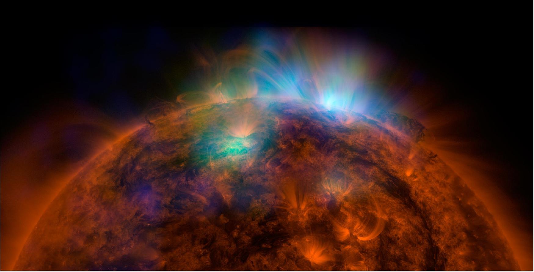 Figure 11: X-rays from the Sun – seen in the green and blue observations by NASA's NuSTAR – come from gas heated to more than 5.4 million degrees Fahrenheit (3 million degrees Celsius). Data taken by NASA's Solar Dynamics Observatory, seen in orange, shows material around 1.8 million F (1 million C), image credit: NASA/JPL-Caltech/GSFC