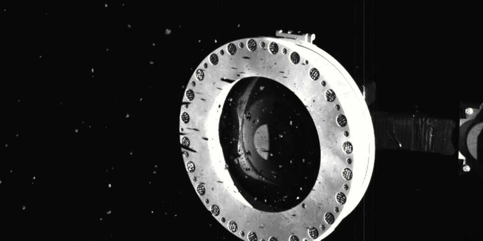 Figure 24: Captured by the spacecraft’s SamCam camera on Oct. 22, 2020, this series of three images shows that the sampler head on NASA’s OSIRIS-REx spacecraft is full of rocks and dust collected from the surface of the asteroid Bennu. They show also that some of these particles are slowly escaping the sampler head. Analysis by the OSIRIS-REx team suggests that bits of material are passing through small gaps where the head’s mylar flap is slightly wedged open. The mylar flap (the black bulge on the left inside the ring) is designed to keep the collected material locked inside, and these unsealed areas appear to be caused by larger rocks that didn’t fully pass through the flap. Based on available imagery, the team suspects there is plentiful sample inside the head, and is on a path to stow the sample as quickly as possible (image credit: NASA)