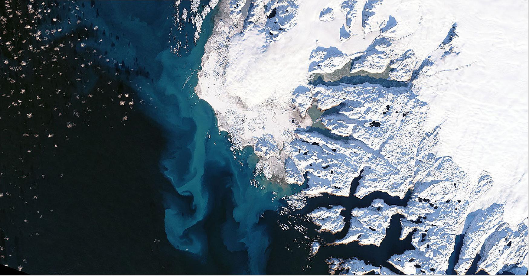 Figure 15: Meltwater from Greenland glaciers like the one pictured can contribute significantly to sea level rise. Sentinel-6 Michael Freilich monitors the height of Earth's oceans so that researchers can better understand the amount and rate of sea level rise (image credit: NASA Earth Observatory using Landsat data from USGS)