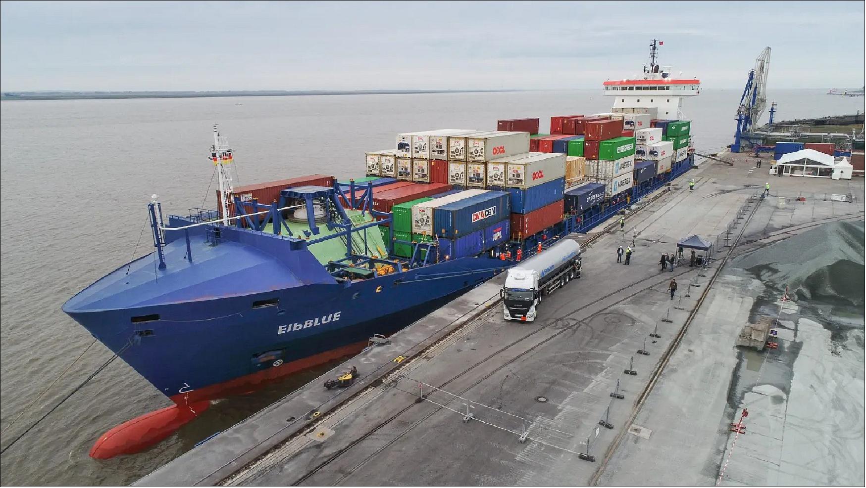 Figure 55: The containership, ElbBLUE has bunkered green SNG (synthetic natural gas) at the Elbe port in Brunsbüttel, Germany. MAN Energy Solutions has reported that the 1,036-TEU container ship, ElbBLUE – the former Wes Amelie – has reduced its greenhouse gas (GHG) emissions by 27 percent by operating on a blend of climate-neutral, synthetic natural gas (SNG) and conventional liquefied natural gas (LNG), compared to LNG alone (image credit: Elbdeich, Unifeeder)