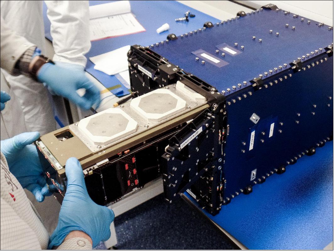 Figure 4: A NanoRacks-LEMUR-2 3U CubeSat is being loaded into the NanoRacks CubeSat Deployer (image credit: Spire Global)