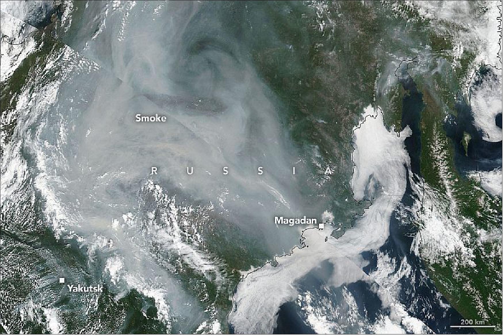 Figure 40: Large, smoky fires are raging through forests in northeastern Russia. The VIIRS (Visible Infrared Imaging Radiometer Suite) on Suomi NPP acquired this natural-color image of large clouds of smoke enveloping the Republic of Sakha (Yakutia) on July 5, 2021. Satellite data indicates that several small fires burned intermittently in the area for weeks, but several exploded in size during the last week of June (image credit: NASA Earth Observatory images by Lauren Dauphin, using MODIS data from NASA EOSDIS LANCE and GIBS/Worldview and Landsat data from the U.S. Geological Survey. Story by Adam Voiland)