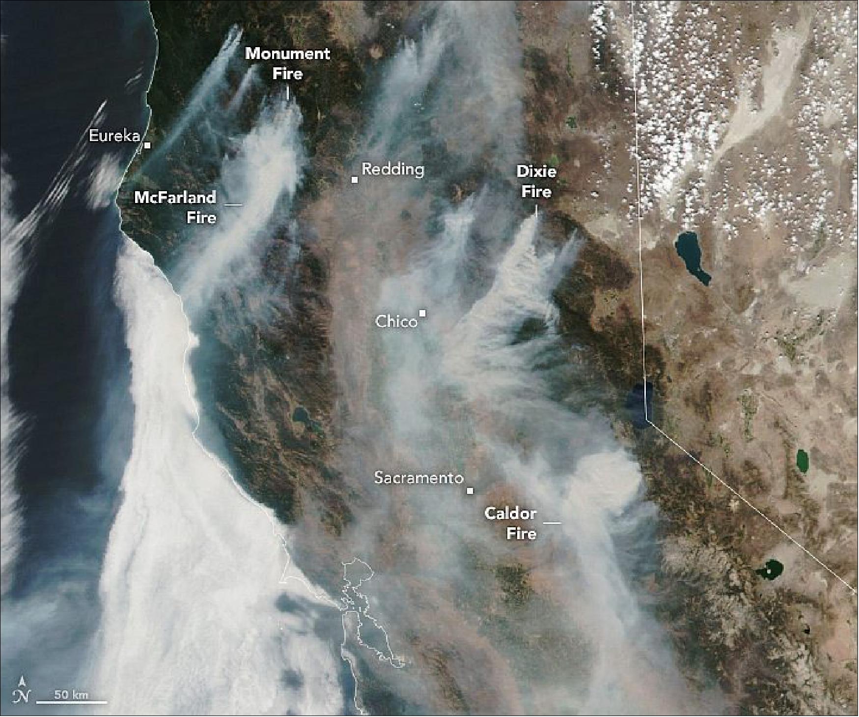 Figure 38: Several destructive fires have charred landscapes in northern California, and their emissions are adding up. On August 19, 2021, the Visible Infrared Imaging Radiometer Suite (VIIRS) on the NOAA-NASA Suomi NPP satellite acquired a natural-color image (above) of fires raging in California. While smoke has often blown west in recent weeks, shifting winds have begun to darken skies in northern and central California, triggering air quality alerts in Sacramento and San Francisco. (image credit: NASA Earth Observatory images by Lauren Dauphin, using Landsat data from the U.S. Geological Survey and VIIRS data from NASA EOSDIS LANCE, GIBS/Worldview, and the Suomi National Polar-orbiting Partnership. Story by Adam Voiland)