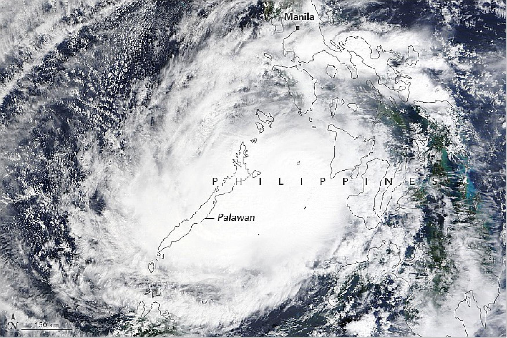 Figure 26: This image, acquired in the late morning on December 17 by the Moderate Resolution Imaging Spectroradiometer (MODIS) on NASA’s Terra satellite, shows the storm on the western side of the Philippines as it started to track northwest. Sustained winds were still whipping at 180 kilometers (110 miles) per hour (image credit: NASA Earth Observatory)