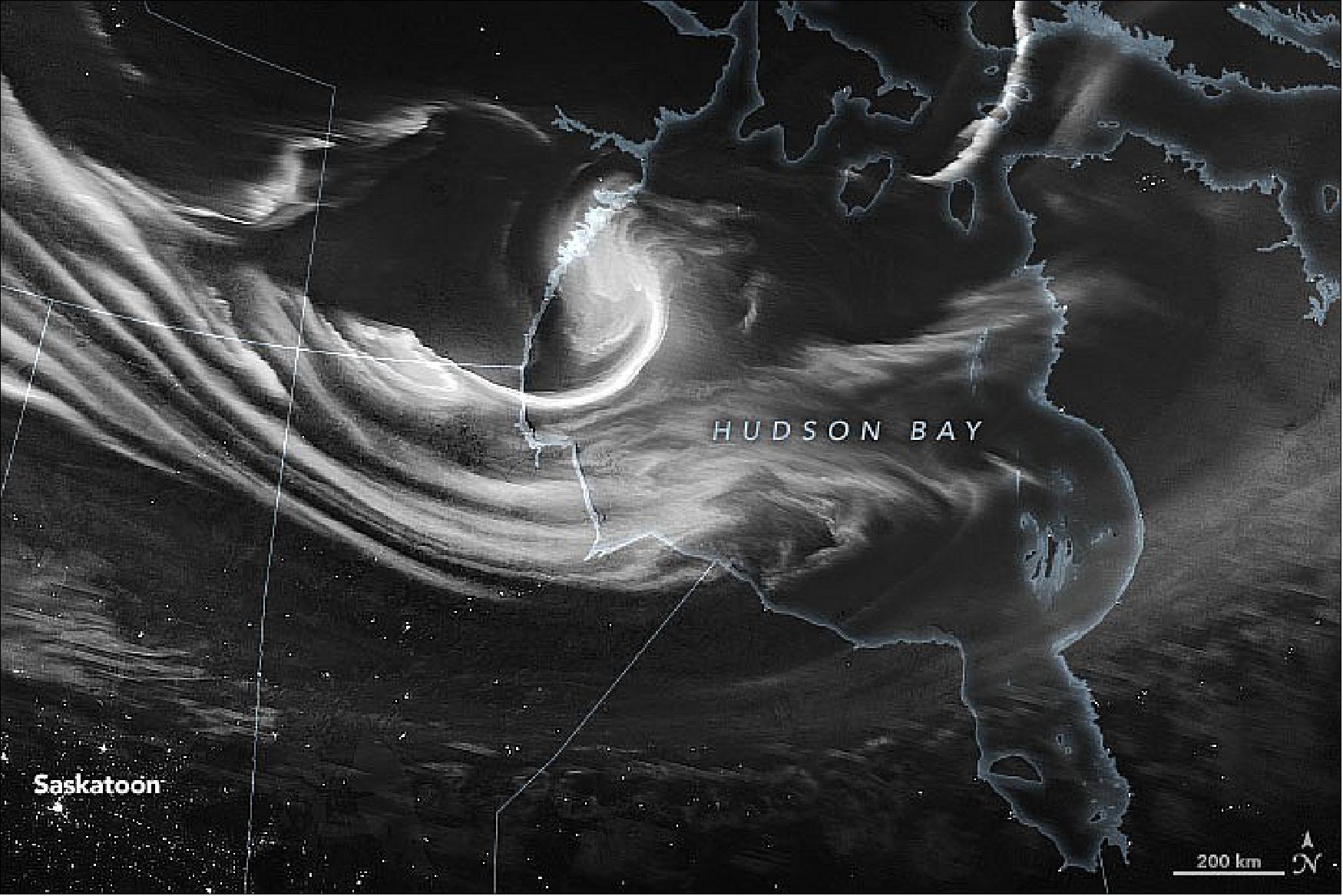 Figure 20: At 2:20 a.m. Central Daylight Time (08:20 Universal Time) on February 4, 2022, the Visible Infrared Imaging Radiometer Suite (VIIRS) on the Suomi NPP satellite acquired this image of the aurora borealis, or “northern lights,” over central Canada and Hudson Bay. (Auroras were visible for three consecutive nights over North America and Northern Europe.) The nighttime image was made possible through the VIIRS “day-night band,” which measures nighttime light emissions and reflections including airglow, city lights, and reflected moonlight (image credit: NASA Earth Observatory image by Joshua Stevens, using VIIRS day-night band data from the Suomi National Polar-orbiting Partnership. Story by Michael Carlowicz)