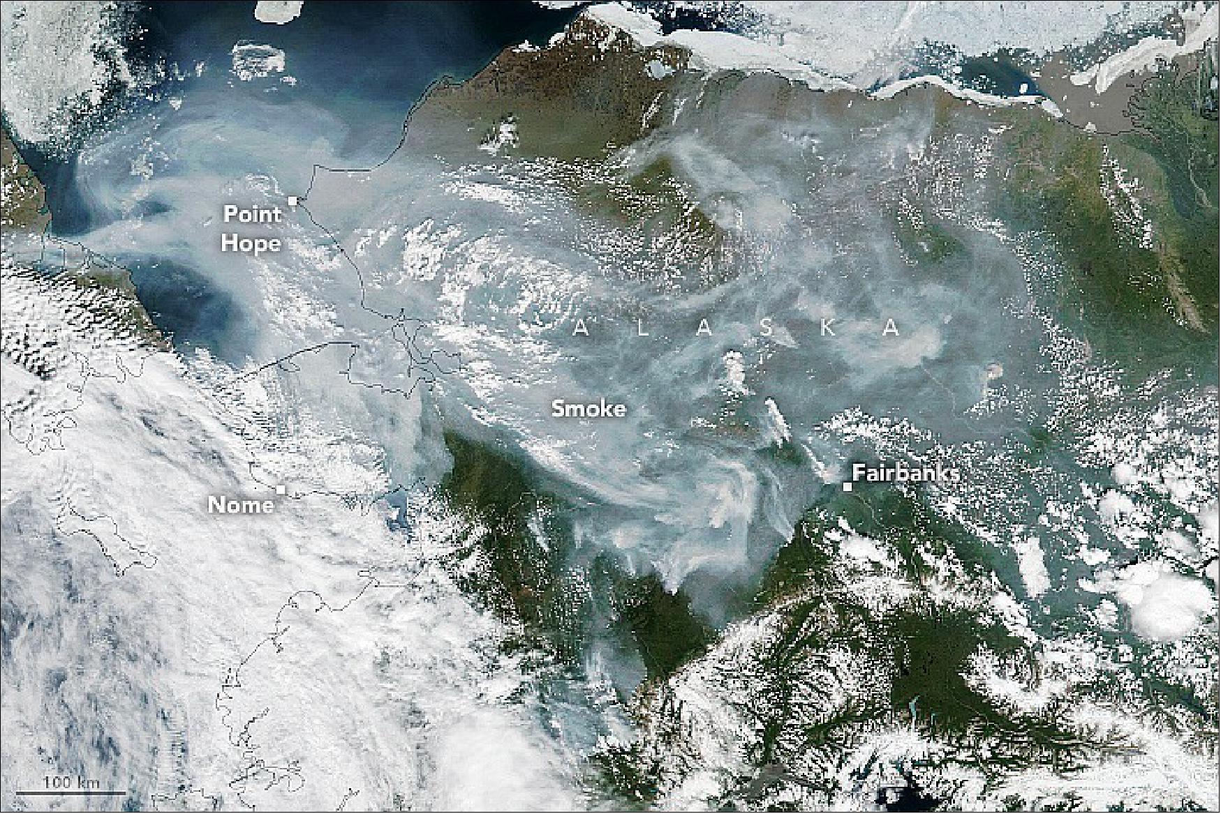 Figure 13: In a scene that was repeated several times in June and early July, the Visible Infrared Imaging Radiometer Suite (VIIRS) on the NASA-NOAA Suomi NPP satellite observed smoke spreading across large portions of Alaska. On July 1, 2022, intense fires were located in the southern and interior regions of the state, but southeasterly winds pushed smoke into the far north as well (image credit: NASA Earth Observatory image by Lauren Dauphin, using VIIRS data from NASA EOSDIS LANCE, GIBS/Worldview, and the Suomi National Polar-orbiting Partnership)