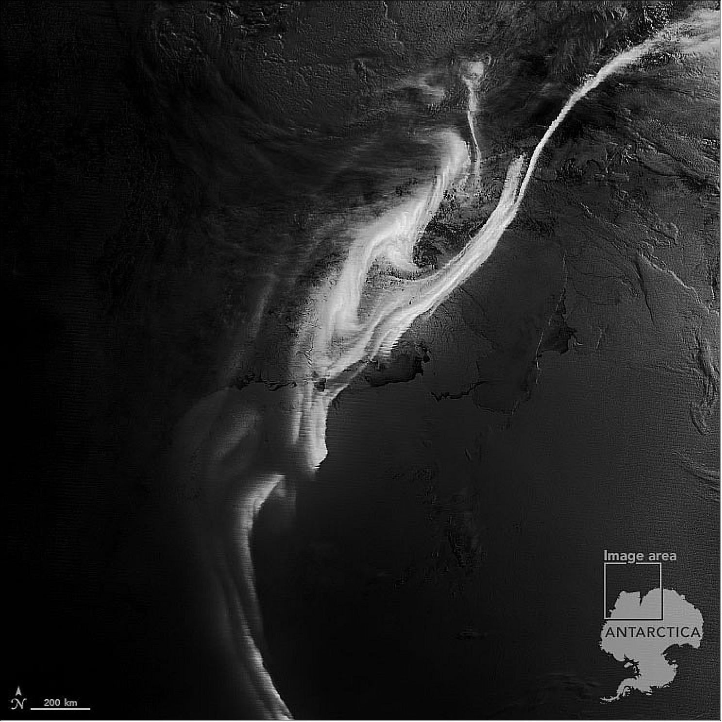 Figure 10: This image was acquired by the Visible Infrared Imaging Radiometer Suite (VIIRS) on the NASA-NOAA Suomi NPP satellite in the early morning hours of July 18, 2022. The aurora and the light of the waning gibbous Moon faintly illuminated the icy coast of eastern Antarctica. VIIRS has a day-night band that detects nighttime light in a range of wavelengths from green to near-infrared and uses filtering techniques to observe signals such as city lights, auroras, and reflected moonlight (image credit: NASA Earth Observatory image by Joshua Stevens, using VIIRS day-night band data from the Suomi National Polar-orbiting Partnership. Story by Michael Carlowicz)