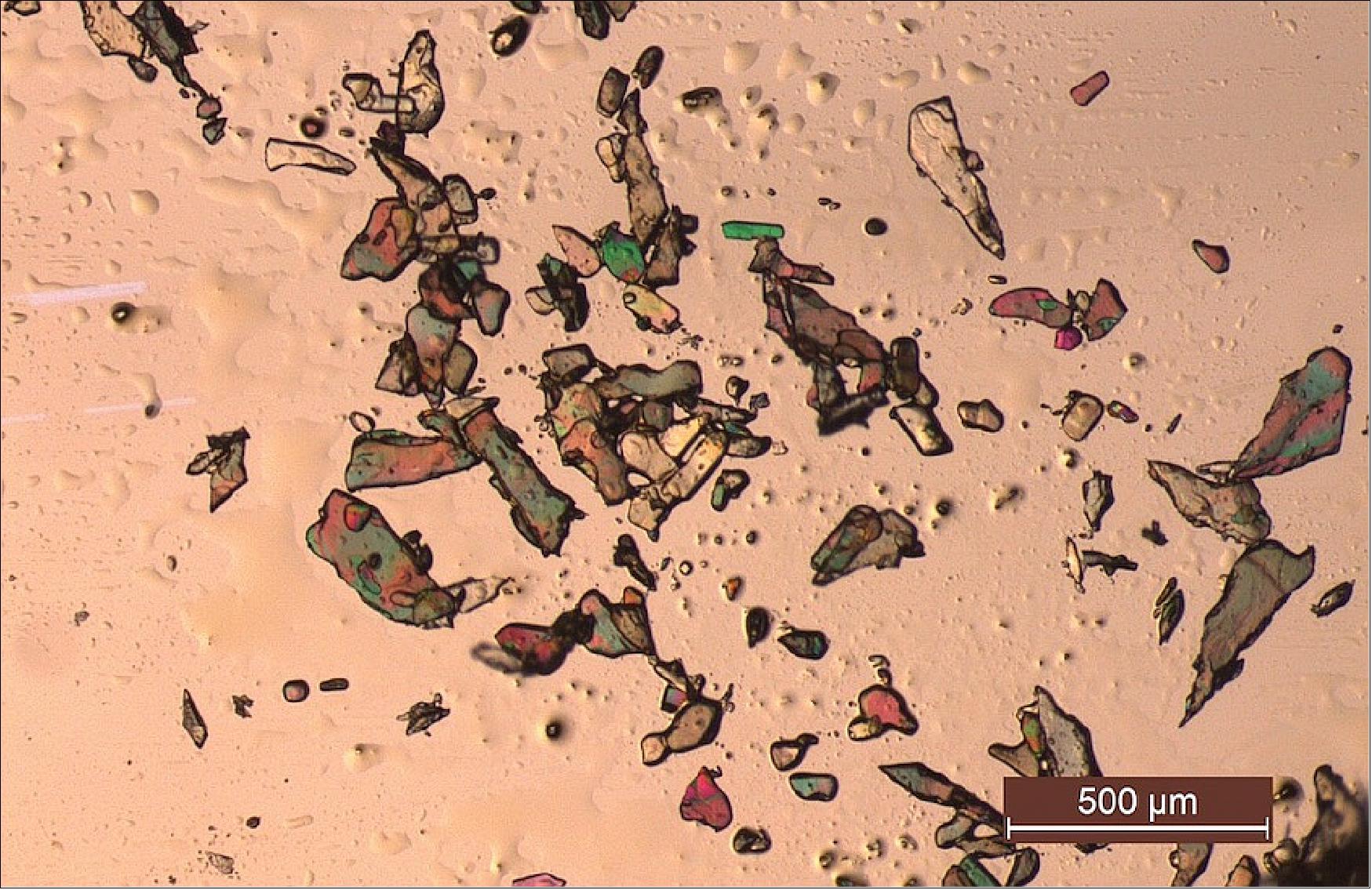 Figure 59: Crystals of acetaldehyde phenylhydrazone appear colorful when exposed to polarized light under a microscope (image credit: Terry Threlfall)