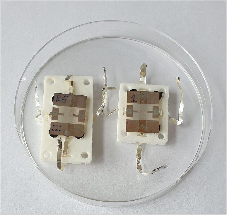 Figure 12: Graphene sensor prototypes. Prototype bi-functional temperature and magnetic sensors based on graphene, placed in the 3D-printed holder seen at their centre. Graphene is the thinnest material known – possessing the thickness of a single atom but 200 times stronger than steel – with a reputation for versatility. Now an ESA-backed project has come up with yet another use for this ‘wonder stuff’, as the basis for a combined temperature and magnetism sensor [image credit: AGP (Advanced Graphene Products)]