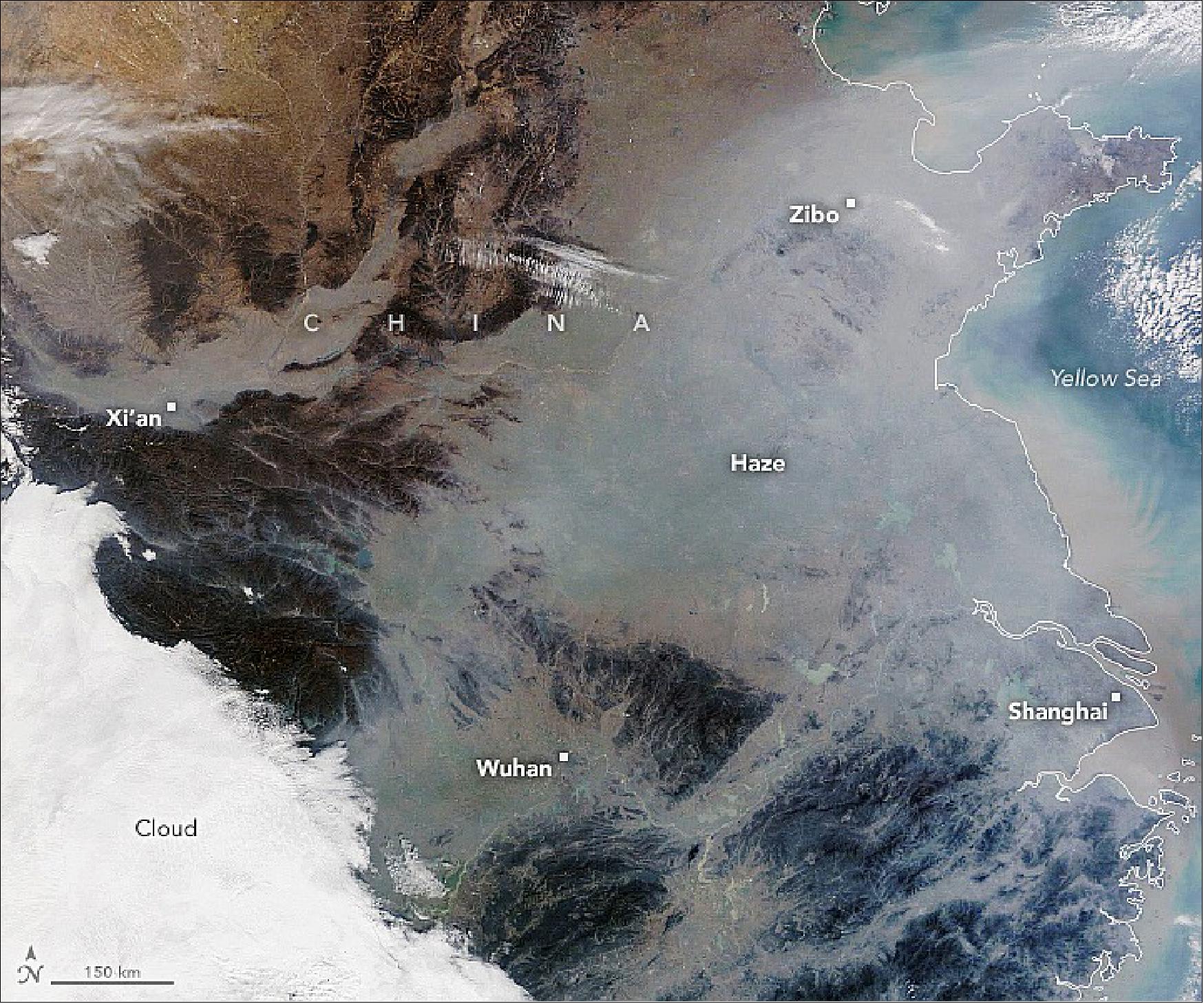 Figure 37: The MODIS instrument on NASA’s Terra satellite acquired this natural-color image of northeastern China on January 3, 2022. A pall of gray haze hangs over valleys and other low-lying areas, partially obscuring cities, farmland, lakes, and other features that would normally be more visible. The bright areas on the lower left of the image are clouds (image credit: NASA Earth Observatory image by Lauren Dauphin, using MODIS data from NASA EOSDIS LANCE and GIBS/Worldview. Story by Adam Voiland)