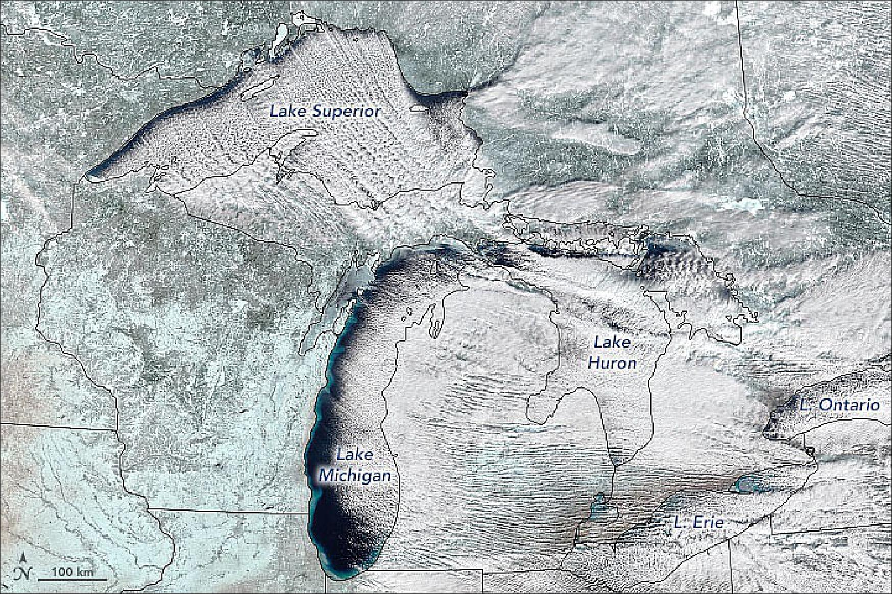 Figure 35: Winter winds can create long, thin cloud bands that stretch hundreds of kilometers across the sky. The MODIS instrument on NASA’s Terra satellite spied such an event over the Great Lakes on January 10, 2022. The image is a composite of natural color, shortwave infrared, and near infrared—a combo that helps distinguish snow and ice (blue/cyan) from clouds (white). The cloud streets that day stretched across hundreds of kilometers, mostly arising from Lake Superior and Lake Michigan (image credit: NASA Earth Observatory image by Joshua Stevens, using MODIS data from NASA EOSDIS LANCE and GIBS/Worldview. Story by Michael Carlowicz and Adam Voiland)