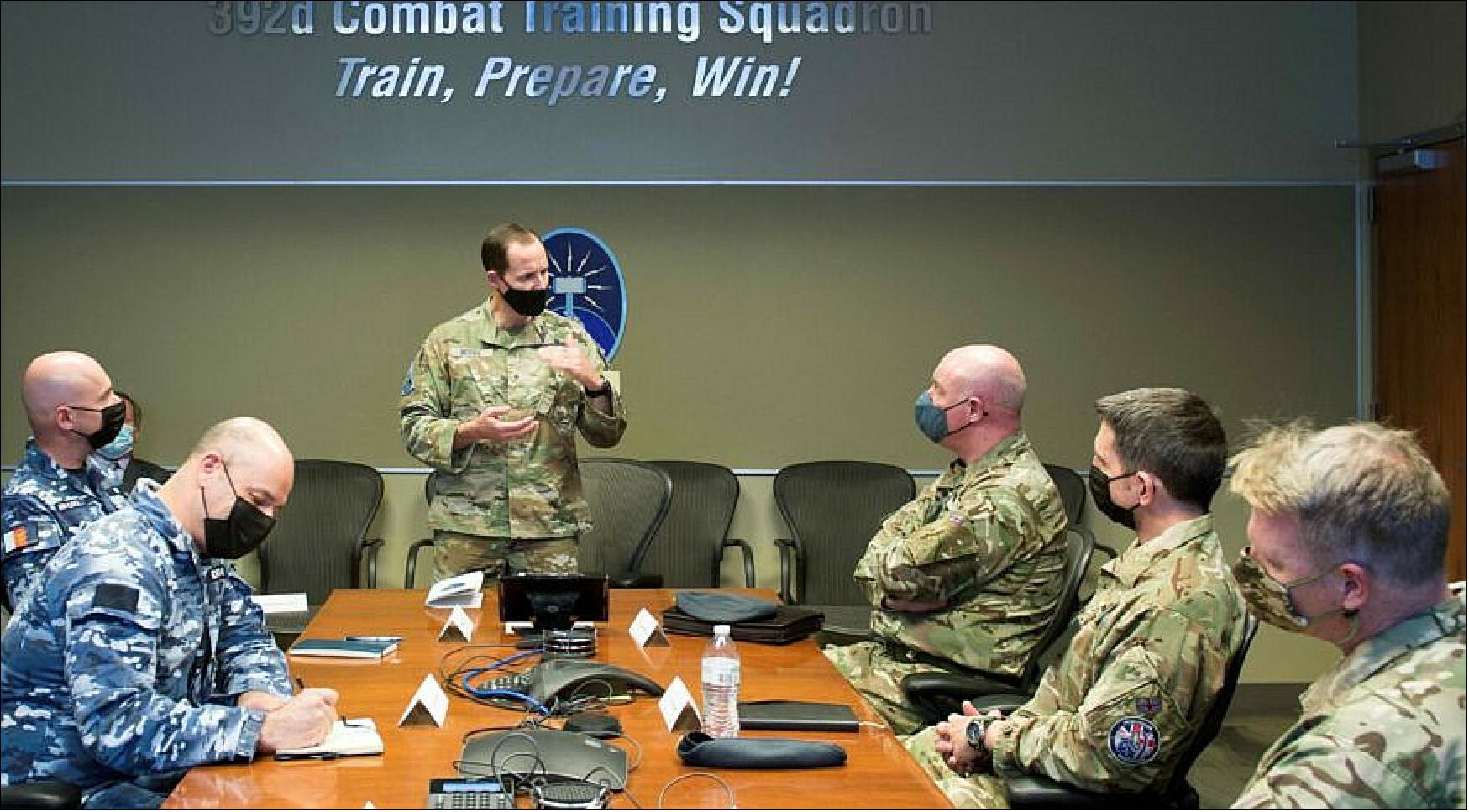 Figure 18: U.S. Space Force Brig Gen Todd Moore, Space Training and Readiness Command Deputy Commander, speaks with visitors from the United Kingdom, and Australia on Space Flag at Schriever Space Force Base, Colorado, Dec. 13, 2021 (image credit: U.S. Space Force)