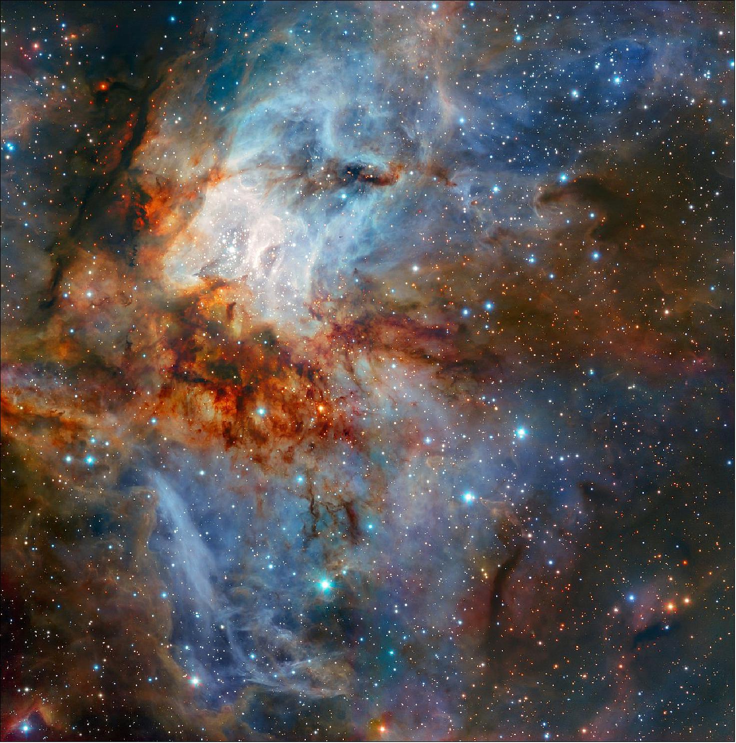 Figure 70: This image shows the star cluster RCW 38, as captured by the HAWK-I infrared imager mounted on ESO’s VLT (Very Large Telescope) in Chile. By gazing into infrared wavelengths, HAWK-I can examine dust-shrouded star clusters like RCW 38, providing an unparalleled view of the stars forming within. This cluster contains hundreds of young, hot, massive stars, and lies some 5500 light-years away in the constellation of Vela (The Sails), image credit: