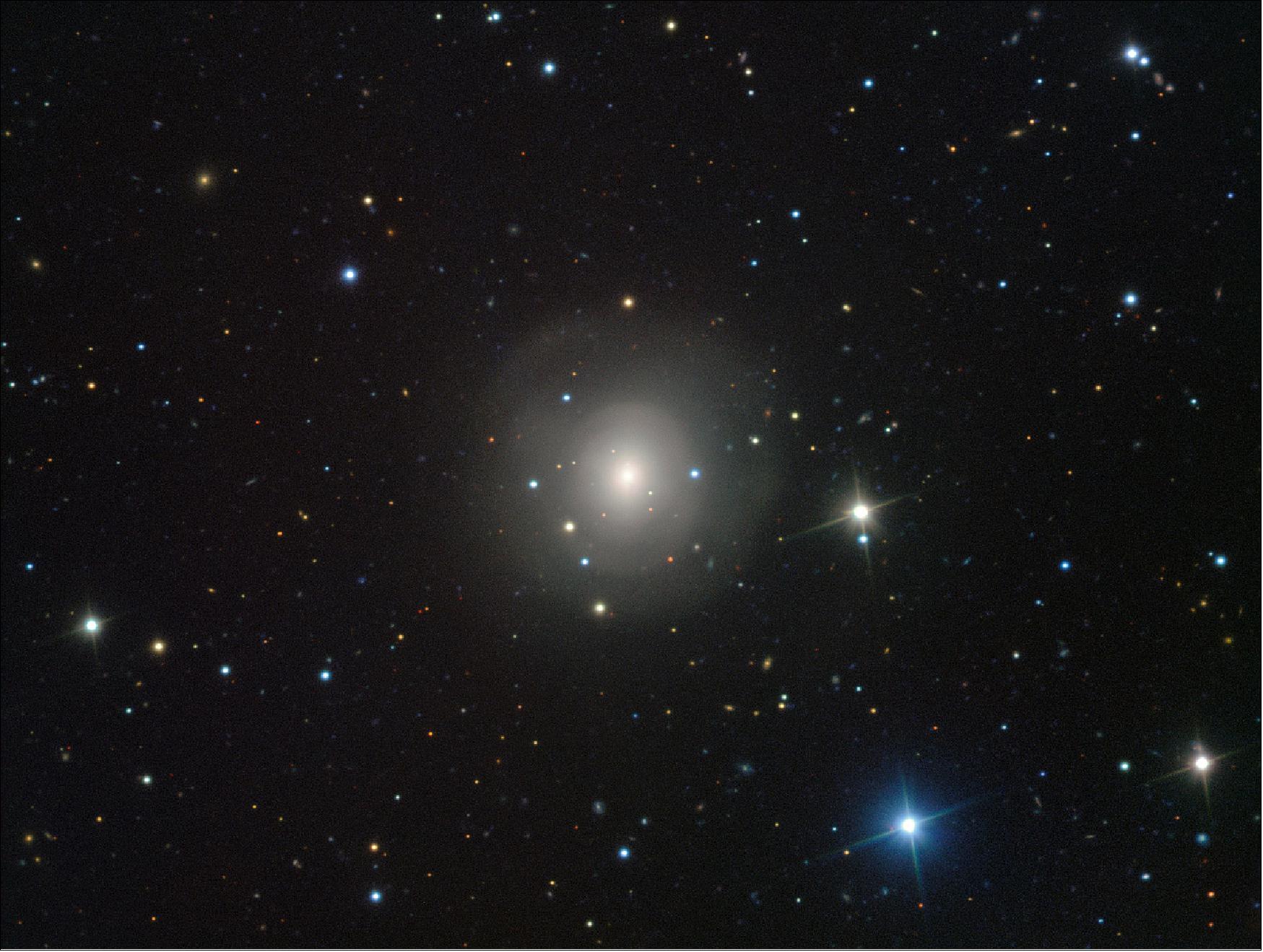 Figure 83: The elliptical galaxy NGC 4993, about 130 million light-years from Earth, viewed with the VIMOS instrument on the European Southern Observatory's Very Large Telescope in Chile. After the almost simultaneous detection of gravitational waves by the LIGO/Virgo collaboration and of a gamma-ray burst by ESA's INTEGRAL and NASA's Fermi satellites, a large number of ground and space telescopes started searching for the source in the sky (image credit: ESO/A. J. Levan, N.R. Tanvir, CC BY 4.0, Ref. 88)
