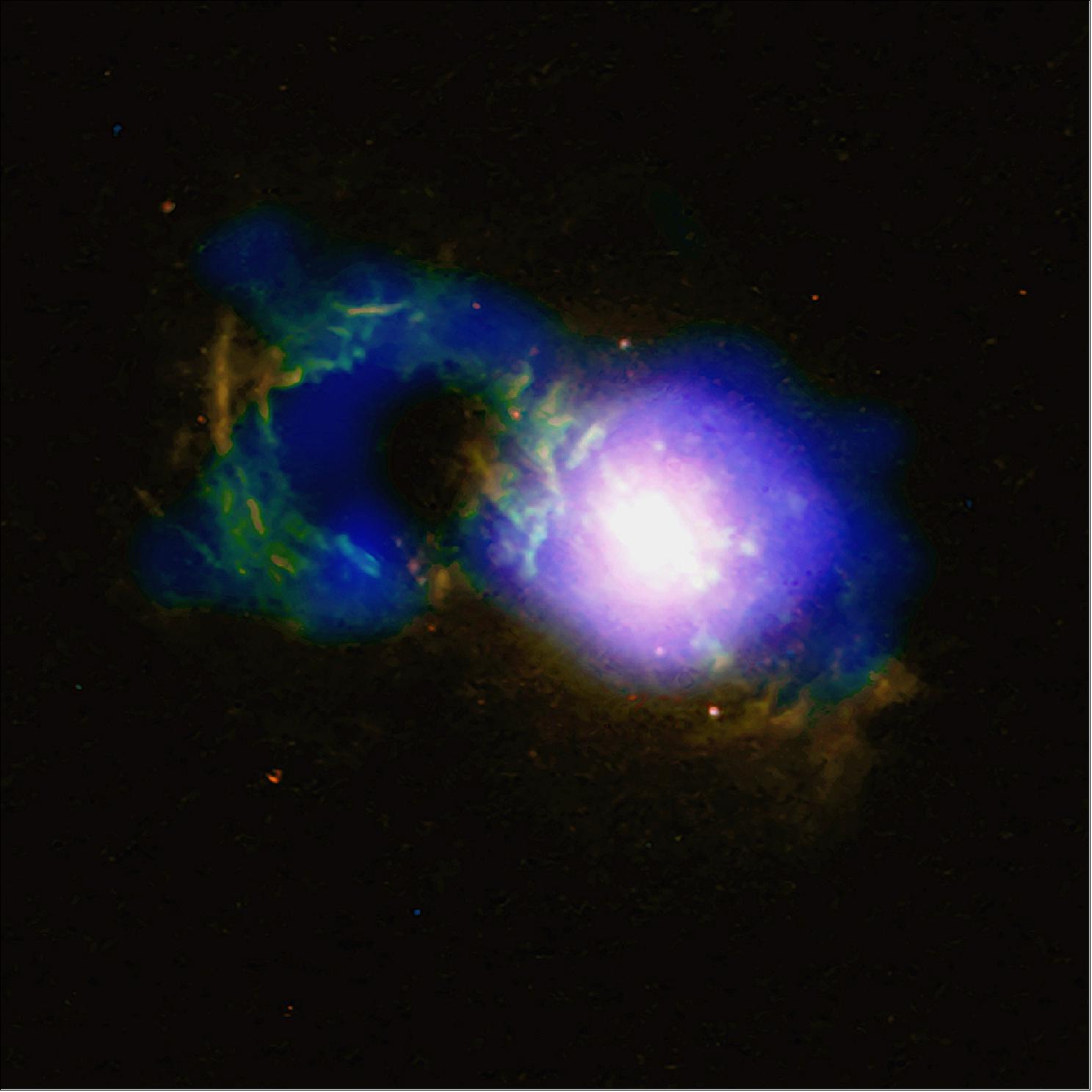 Figure 57: In the image shown here the X-ray data is colored in blue and optical observations from the NASA/ESA Hubble Space Telescope are shown in red and green. Another image including radio data also shows a second ‘handle’ on the other side of the 'cup' (image credit: X-ray: NASA/CXC/University of Cambridge/G. Lansbury et al; optical: NASA/STScI/W. Keel et al.)